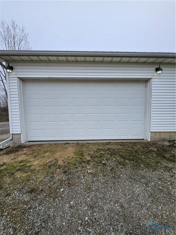10308 Dowling Rd, Perrysburg, OH 43551 - garage featuring driveway