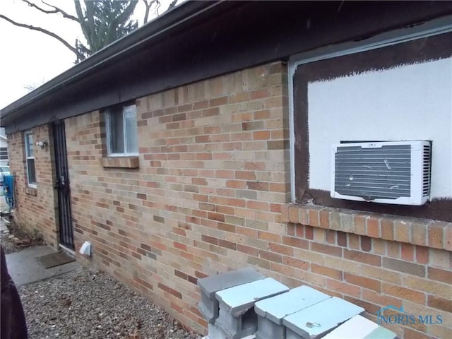 2332 Airline Ave, Toledo, OH 43609 - view of property exterior featuring brick siding and cooling unit