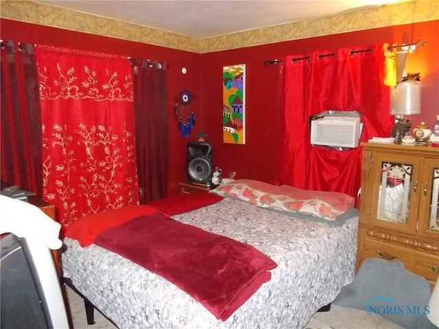 2332 Airline Ave, Toledo, OH 43609 - bedroom featuring carpet and a wall mounted air conditioner