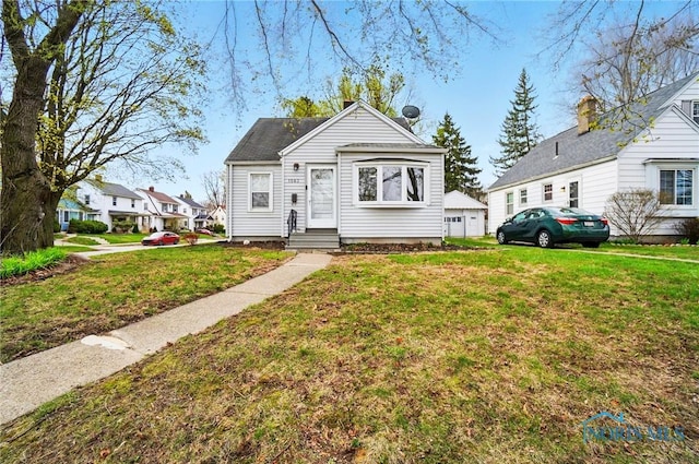 1563 Crestwood Rd, Toledo, OH 43612 - bungalow with entry steps and a front lawn