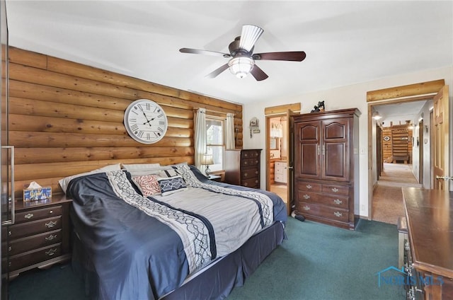 2525 N King Rd, Toledo, OH 43615 - carpeted bedroom featuring rustic walls, ceiling fan, and ensuite bathroom