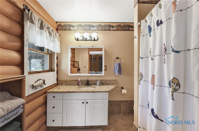 2525 N King Rd, Toledo, OH 43615 - bathroom with vanity, tile patterned flooring, a shower with curtain, and rustic walls