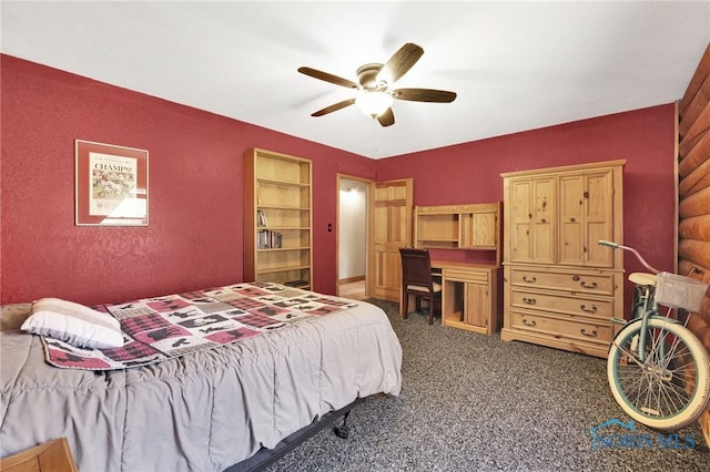 2525 N King Rd, Toledo, OH 43615 - bedroom with carpet floors, a textured wall, a ceiling fan, and a desk