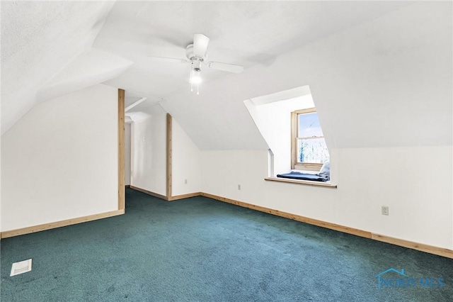 2525 N King Rd, Toledo, OH 43615 - additional living space featuring carpet flooring, vaulted ceiling, a ceiling fan, and baseboards