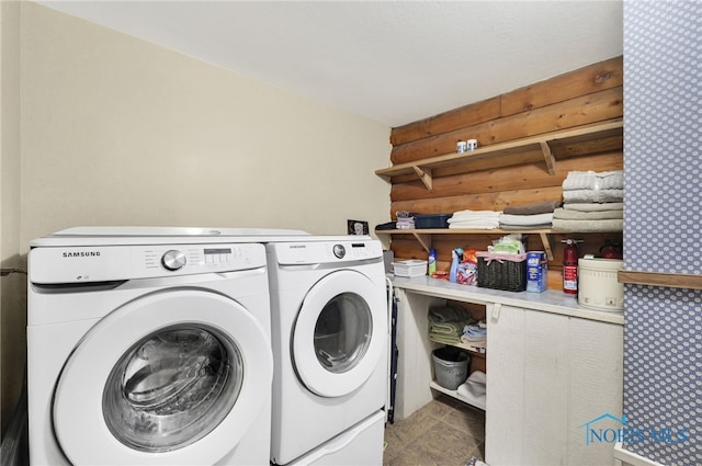 2525 N King Rd, Toledo, OH 43615 - washroom with independent washer and dryer, rustic walls, and wallpapered walls