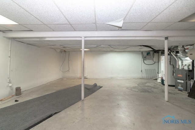 below grade area with gas water heater and heating unit