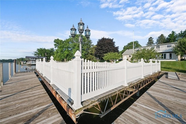 2560 Shoreland Ave, Toledo, OH 43611 - dock featuring a water view