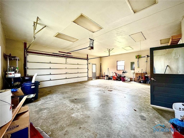 106 Adrian St, Delta, OH 43515 - garage featuring a garage door opener