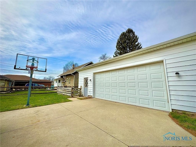 106 Adrian St, Delta, OH 43515 - garage featuring driveway