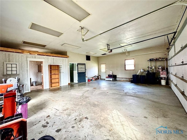 106 Adrian St, Delta, OH 43515 - garage featuring a garage door opener