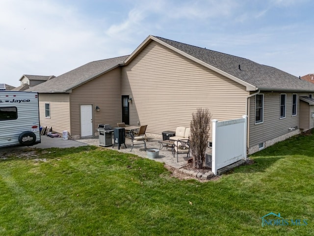 5716 Shawnee Ave, Walbridge, OH 43465 - rear view of property featuring a patio, a yard, a shingled roof, and fence