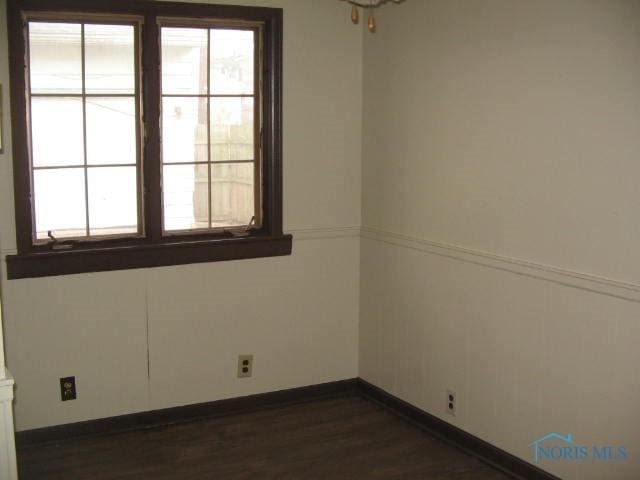 238 E Northgate Pkwy, Toledo, OH 43612 - unfurnished room with dark wood-style floors and baseboards