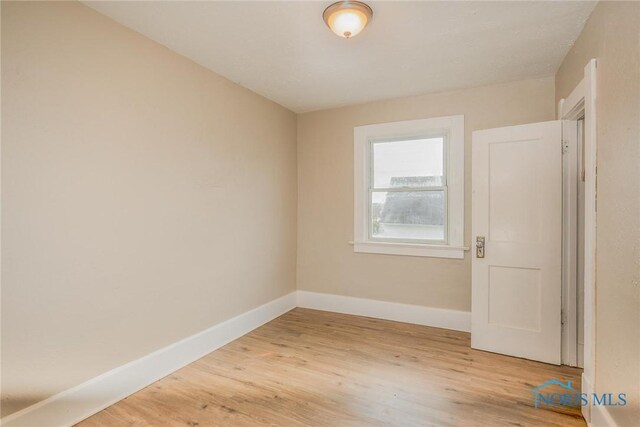 1110 Montrose Ave, Toledo, OH 43607 - unfurnished room with baseboards and wood finished floors