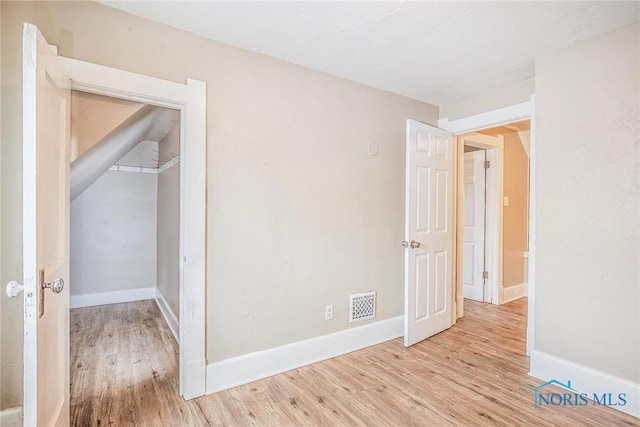 1110 Montrose Ave, Toledo, OH 43607 - interior space featuring visible vents, baseboards, and wood finished floors