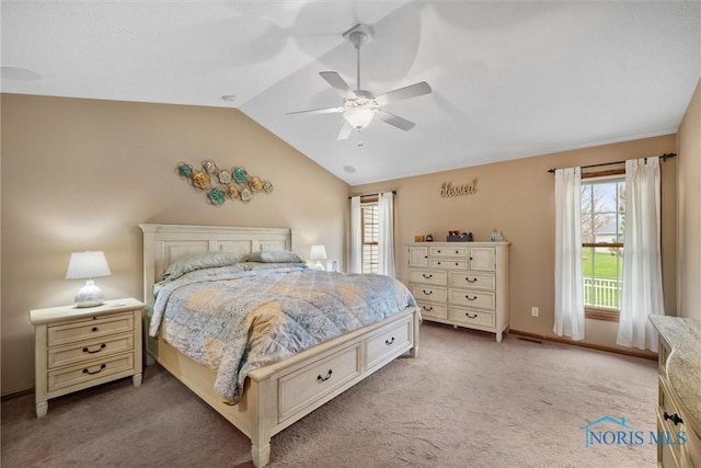 6681 Bellflower Ct, Curtice, OH 43412 - carpeted bedroom featuring lofted ceiling, ceiling fan, and baseboards