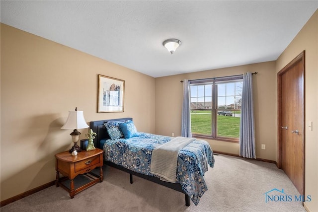 6681 Bellflower Ct, Curtice, OH 43412 - carpeted bedroom featuring baseboards
