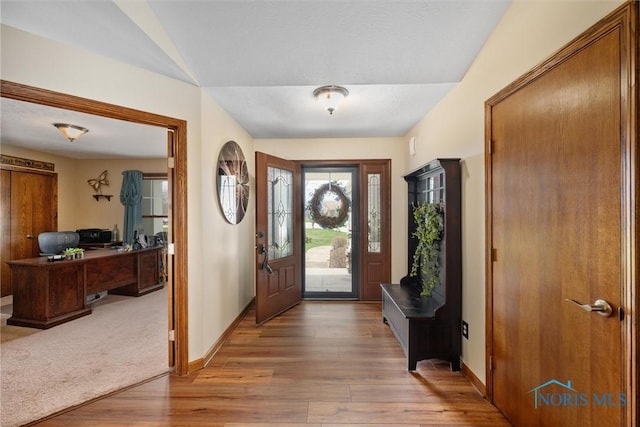 6681 Bellflower Ct, Curtice, OH 43412 - foyer entrance featuring wood finished floors and baseboards