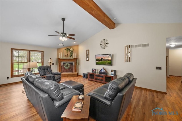 6681 Bellflower Ct, Curtice, OH 43412 - living room with a ceiling fan, wood finished floors, and baseboards