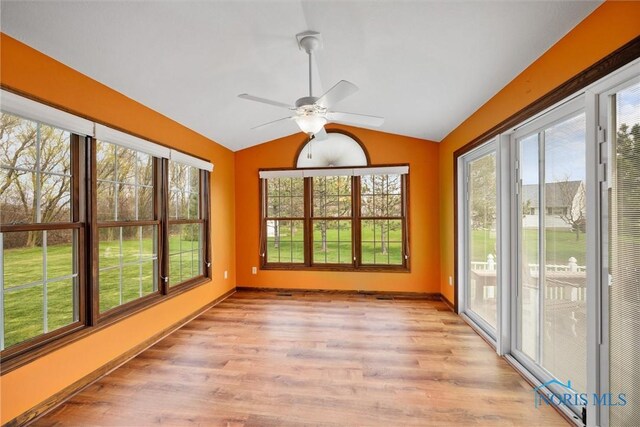 6681 Bellflower Ct, Curtice, OH 43412 - unfurnished sunroom featuring vaulted ceiling and healthy amount of natural light