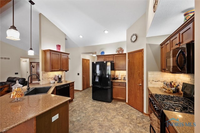 6681 Bellflower Ct, Curtice, OH 43412 - kitchen featuring black appliances, a sink, decorative backsplash, vaulted ceiling, and a peninsula