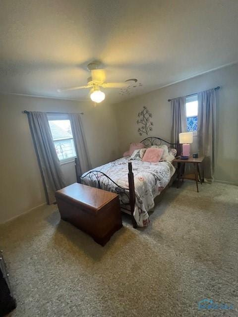 bedroom featuring carpet floors and a ceiling fan