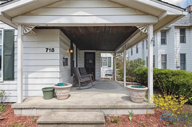 doorway to property with a porch