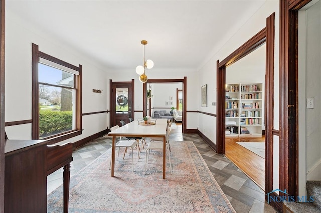 dining space with baseboards