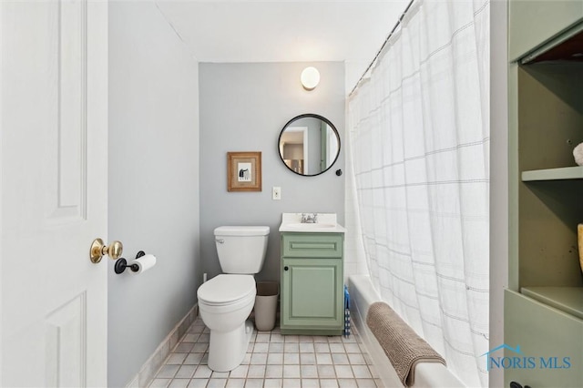 bathroom featuring vanity, baseboards, shower / bath combo, tile patterned floors, and toilet