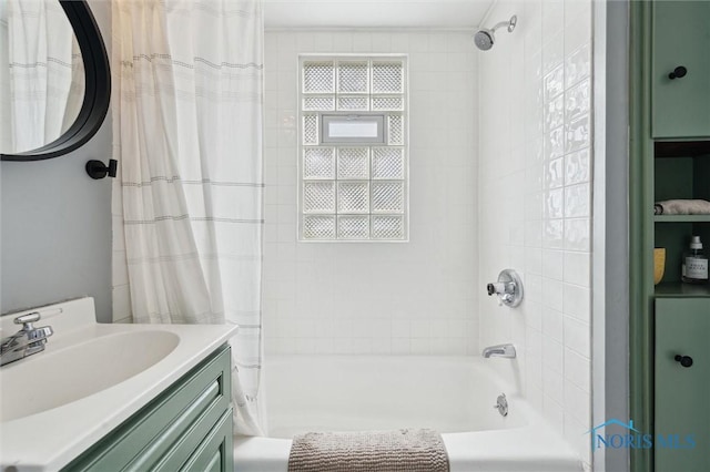 full bath featuring shower / bath combo and vanity