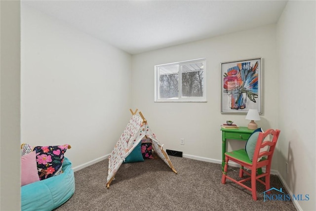 playroom with carpet flooring and baseboards