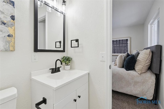 half bath with toilet and vanity