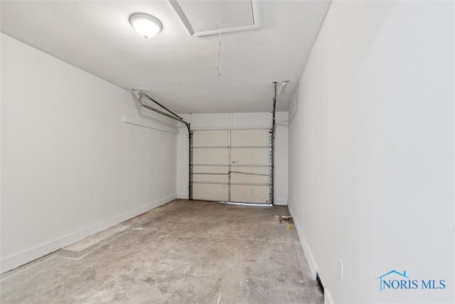 garage with baseboards