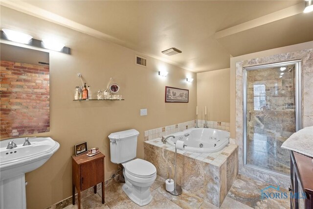 1 S Saint Clair St, Toledo, OH 43604 - full bath with a shower stall, a tub with jets, visible vents, tile patterned flooring, and toilet