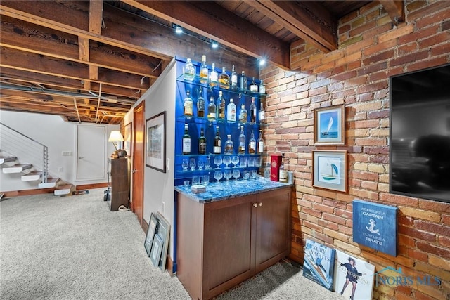 1 S Saint Clair St, Toledo, OH 43604 - bar with indoor wet bar, brick wall, carpet, and stairs