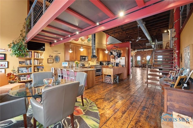 1 S Saint Clair St, Toledo, OH 43604 - interior space with dark wood-type flooring and a towering ceiling