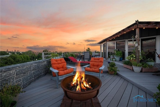 1 S Saint Clair St, Toledo, OH 43604 - wooden deck featuring a fire pit