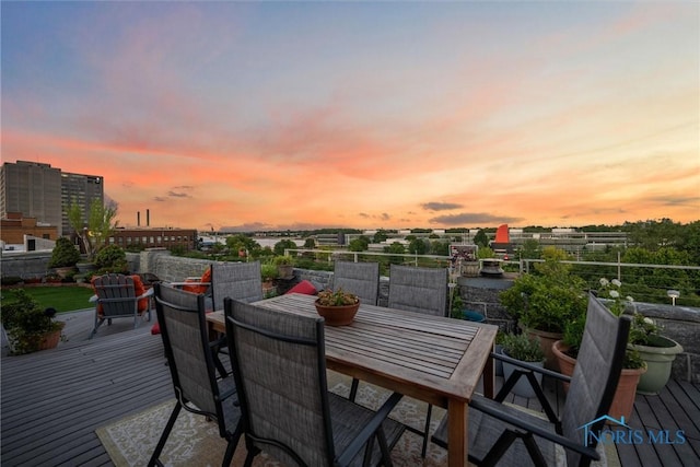 1 S Saint Clair St, Toledo, OH 43604 - deck at dusk with outdoor dining area
