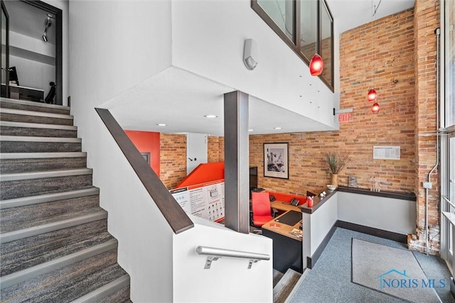 1 S Saint Clair St, Toledo, OH 43604 - stairs featuring brick wall and a high ceiling