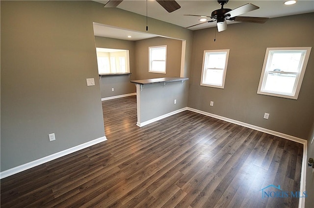 1964 Sudbury Dr, Holland, OH 43528 - spare room with ceiling fan, baseboards, and dark wood finished floors