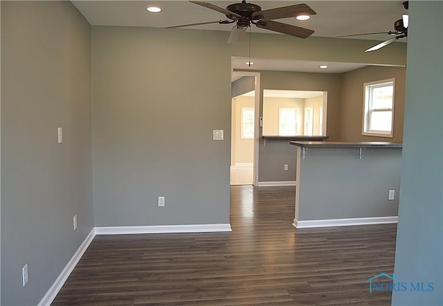 1964 Sudbury Dr, Holland, OH 43528 - unfurnished room featuring ceiling fan, recessed lighting, baseboards, and dark wood finished floors
