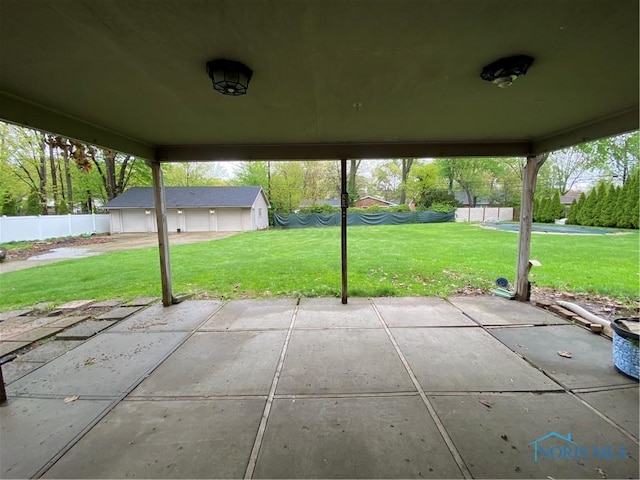 view of patio / terrace featuring fence
