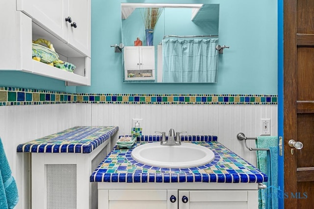 full bathroom with vanity