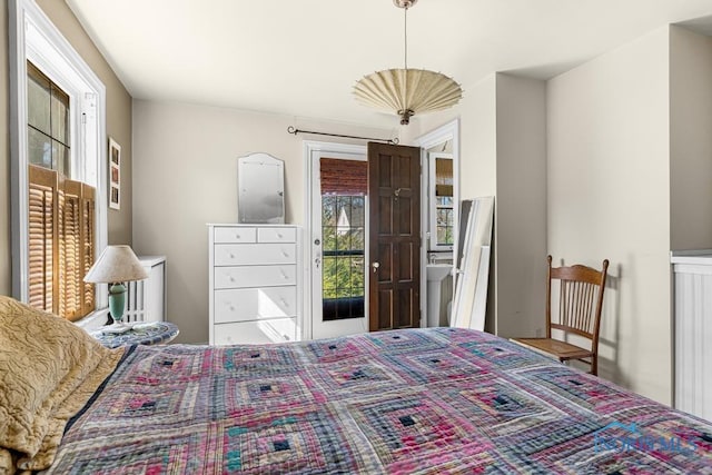 bedroom featuring access to outside