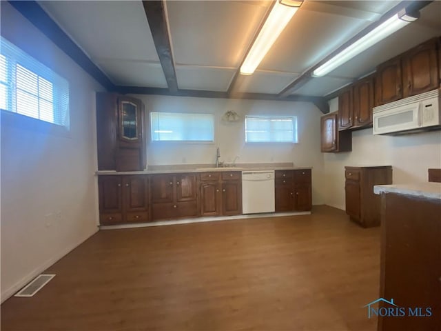 715 Raymer Blvd, Toledo, OH 43605 - kitchen featuring wood finished floors, white appliances, visible vents, and plenty of natural light