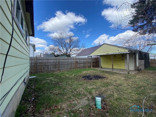 715 Raymer Blvd, Toledo, OH 43605 - view of yard with fence and a patio