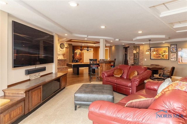 living area featuring a tray ceiling, a bar, pool table, and recessed lighting