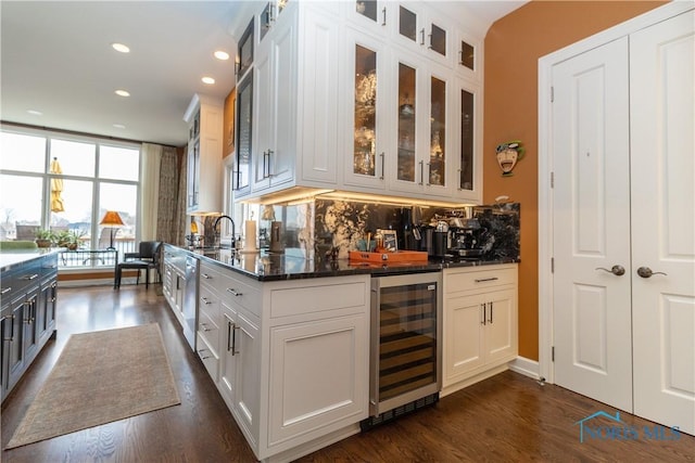 bar with dishwasher, dark wood finished floors, wet bar, wine cooler, and recessed lighting