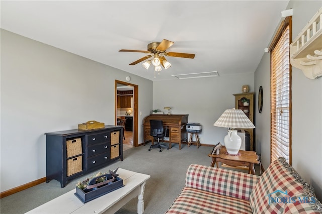 242 E Yates Ave, Findlay, OH 45840 - carpeted living room with a ceiling fan and baseboards