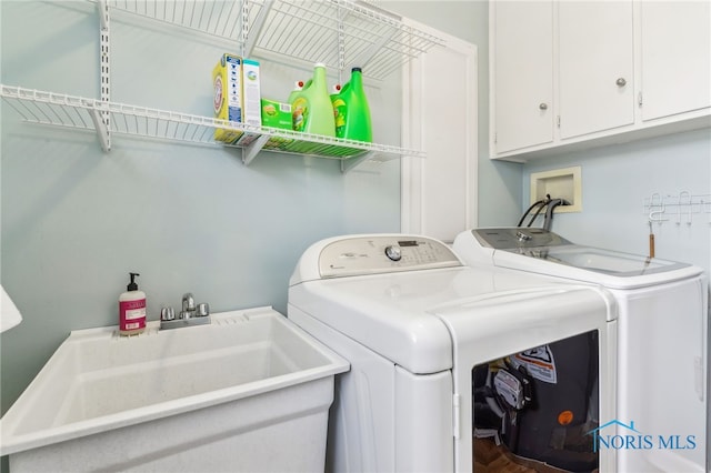 242 E Yates Ave, Findlay, OH 45840 - laundry room featuring washer and dryer and cabinet space