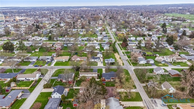 242 E Yates Ave, Findlay, OH 45840 - aerial view of property and surrounding area with nearby suburban area